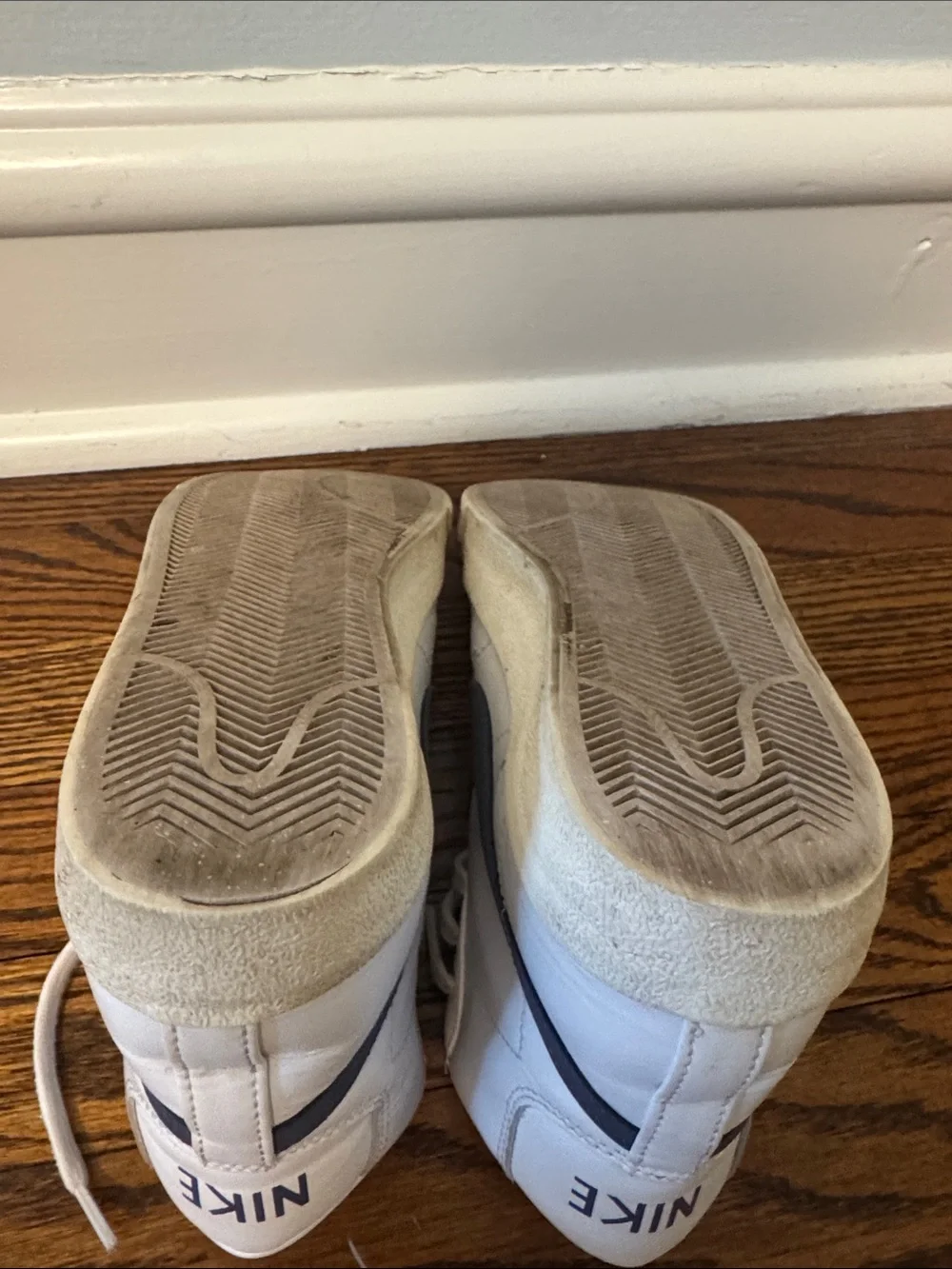 Women’s White High-Top Nike Sneakers
